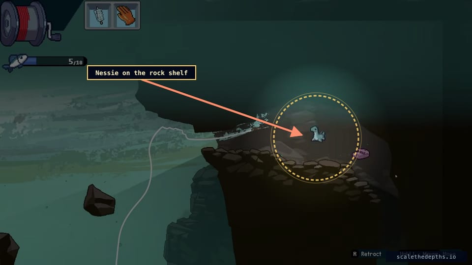 There it is — the small blue plesiosaur sits on the dark rock shelf to the right, with a pink collectable just beyond it. Drift the hook onto the sprite to trigger the pickup.
