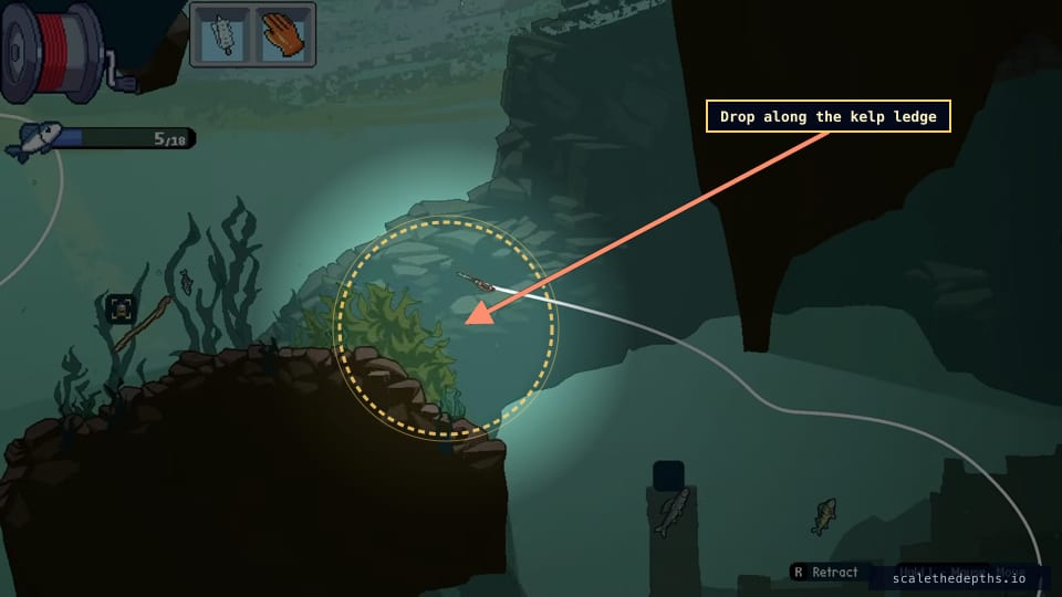 Follow the kelp-covered ledge down. The yellow seaweed and the scroll-shaped object on the left rock confirm you're tracking the correct wall toward Nessie's shelf.